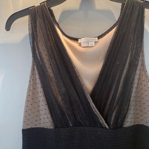 Black sleeveless dress by London Time.